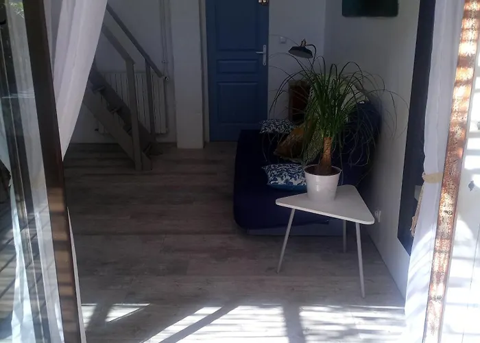 Апартаменты Studio D'aqui Et D'ailleurs